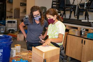woman and girl planning
